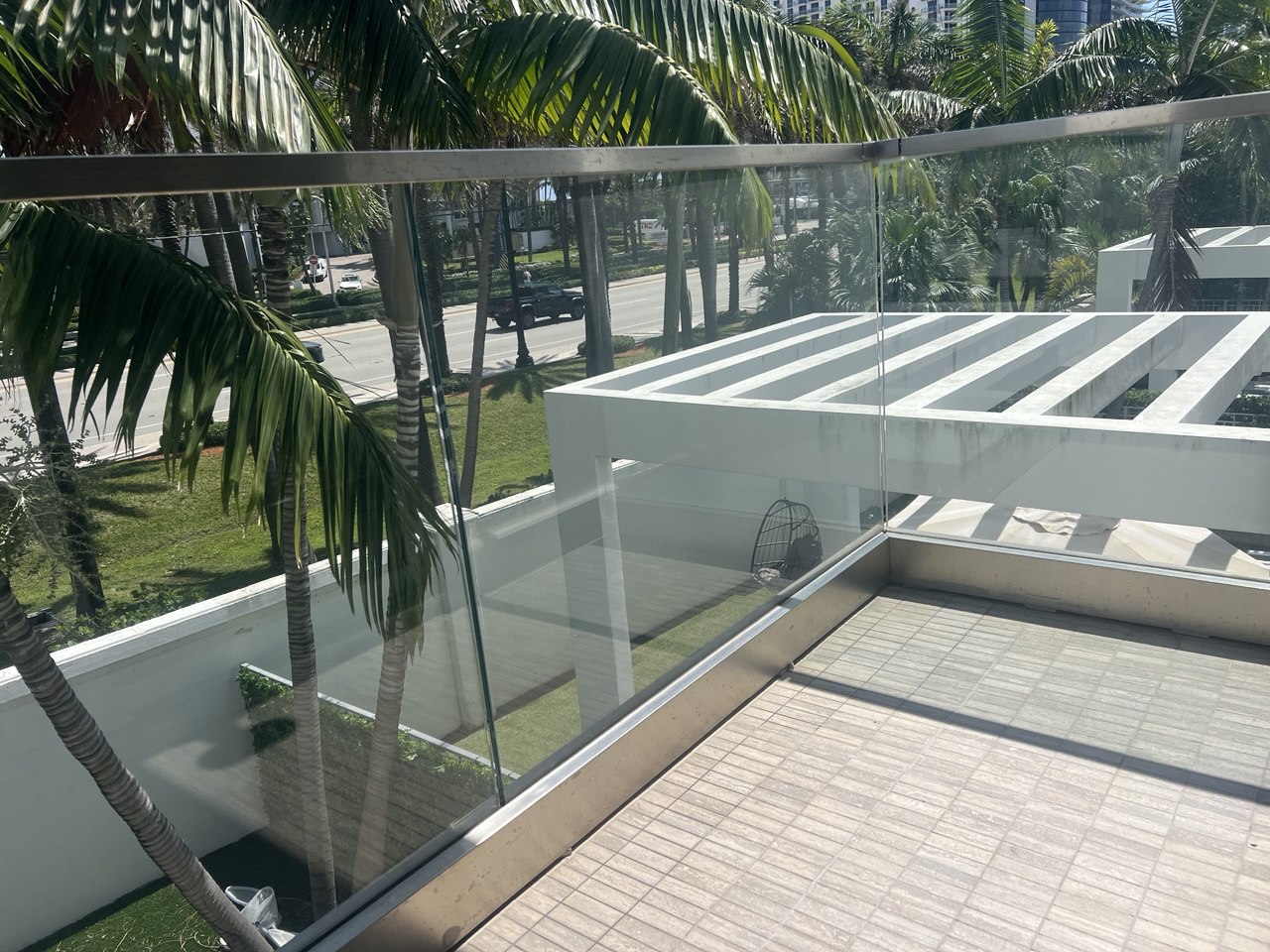 Glass balcony railing installation in Boca Raton by Safe Railing